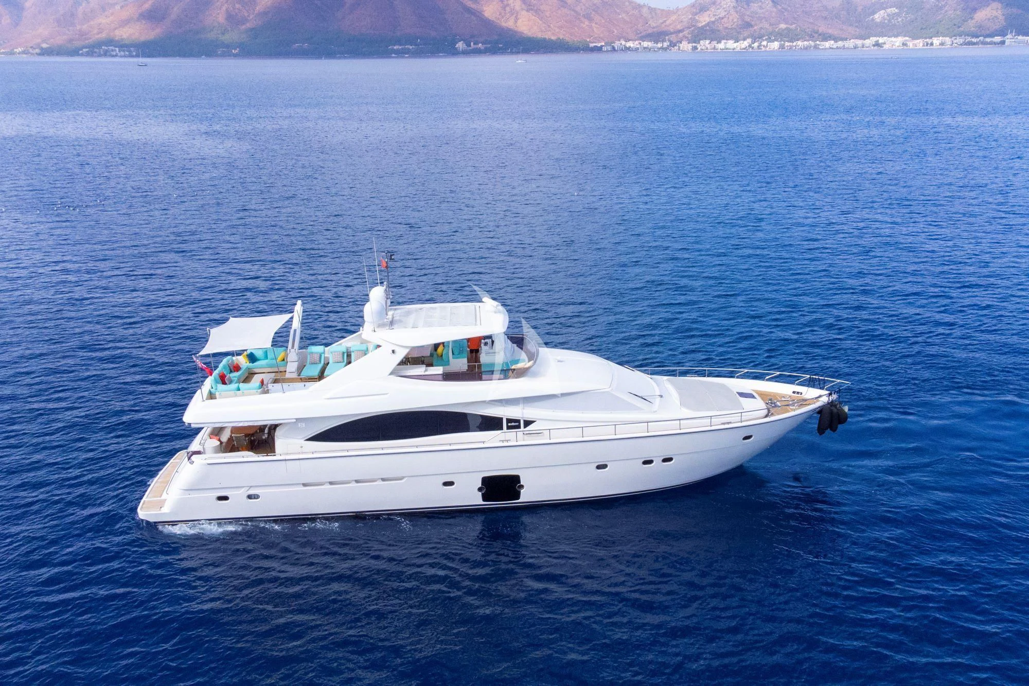 a white yacht in the water aboard ASTARTE Yacht for Sale