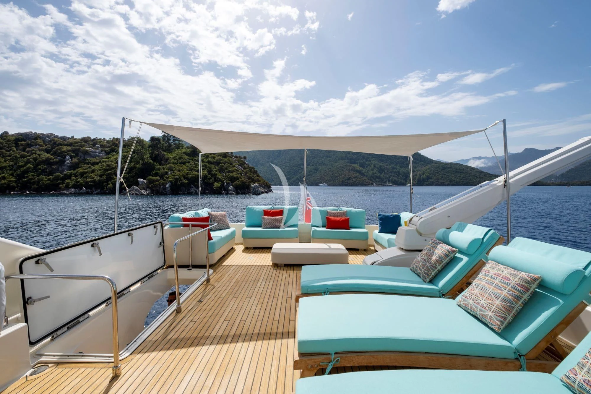 a deck with a pool and a view of the water aboard ASTARTE Yacht for Sale