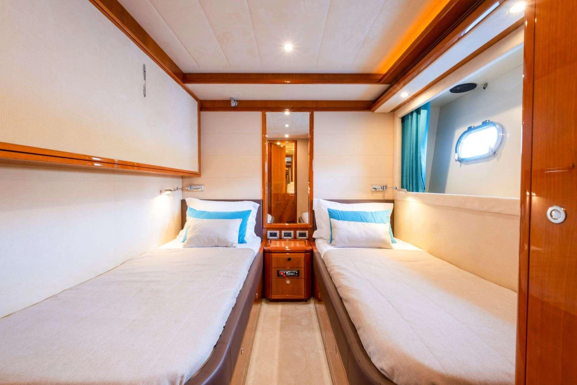 a room with two beds aboard ASTARTE Yacht for Sale