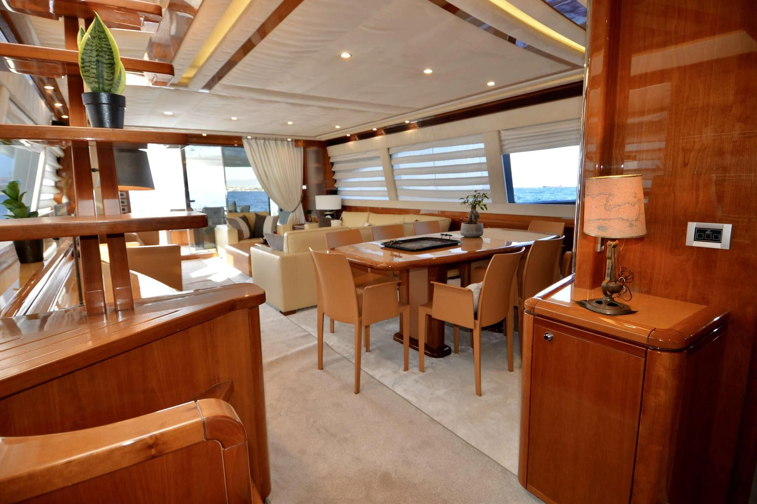 a room with a table and chairs aboard ASTARTE Yacht for Sale