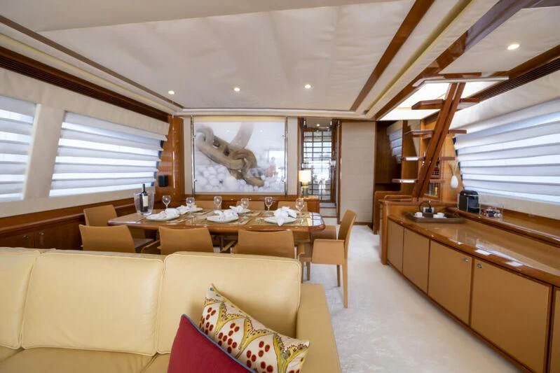a large living room with a large window aboard ASTARTE Yacht for Sale