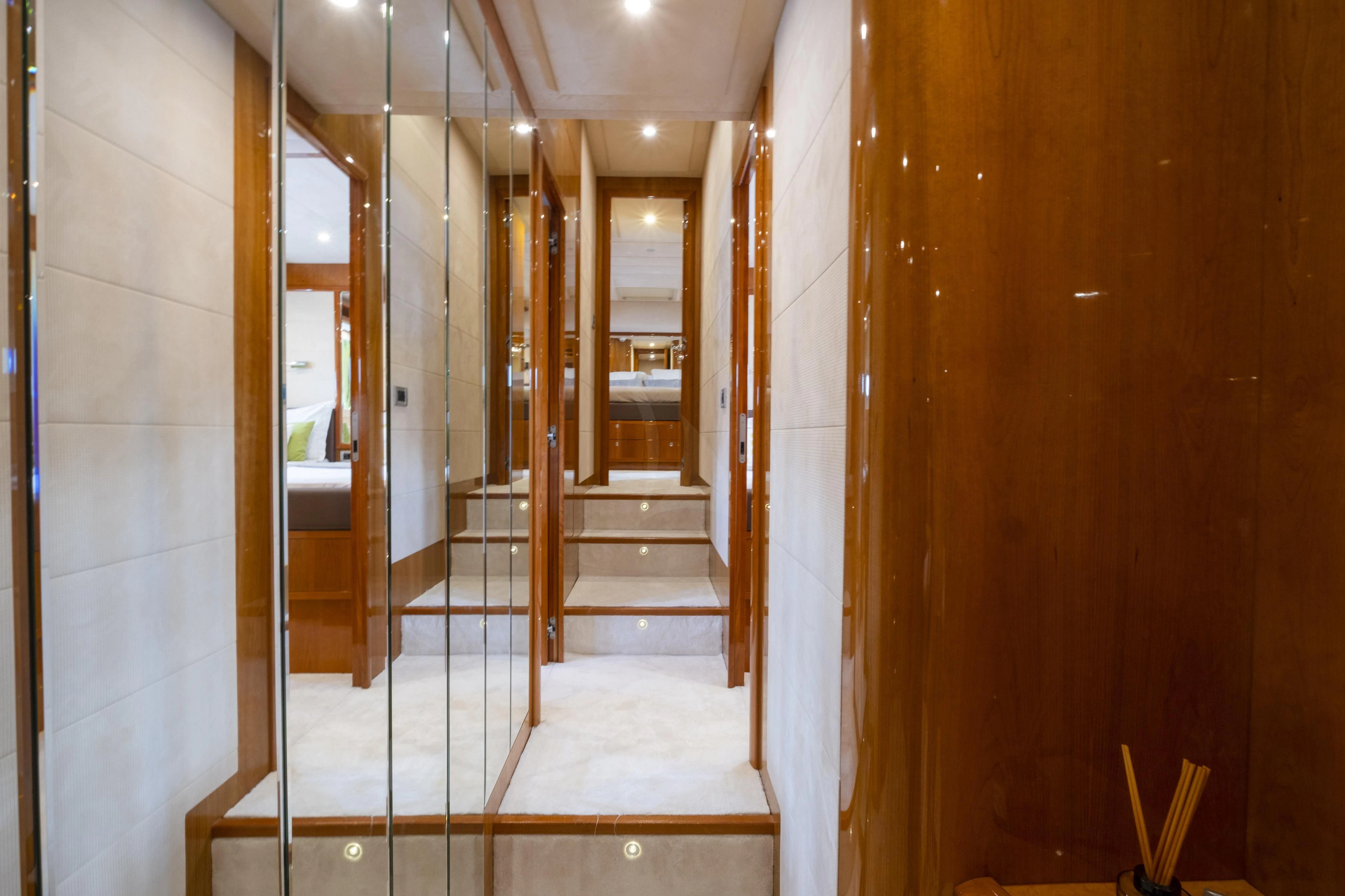 a hallway with a glass door aboard ASTARTE Yacht for Sale