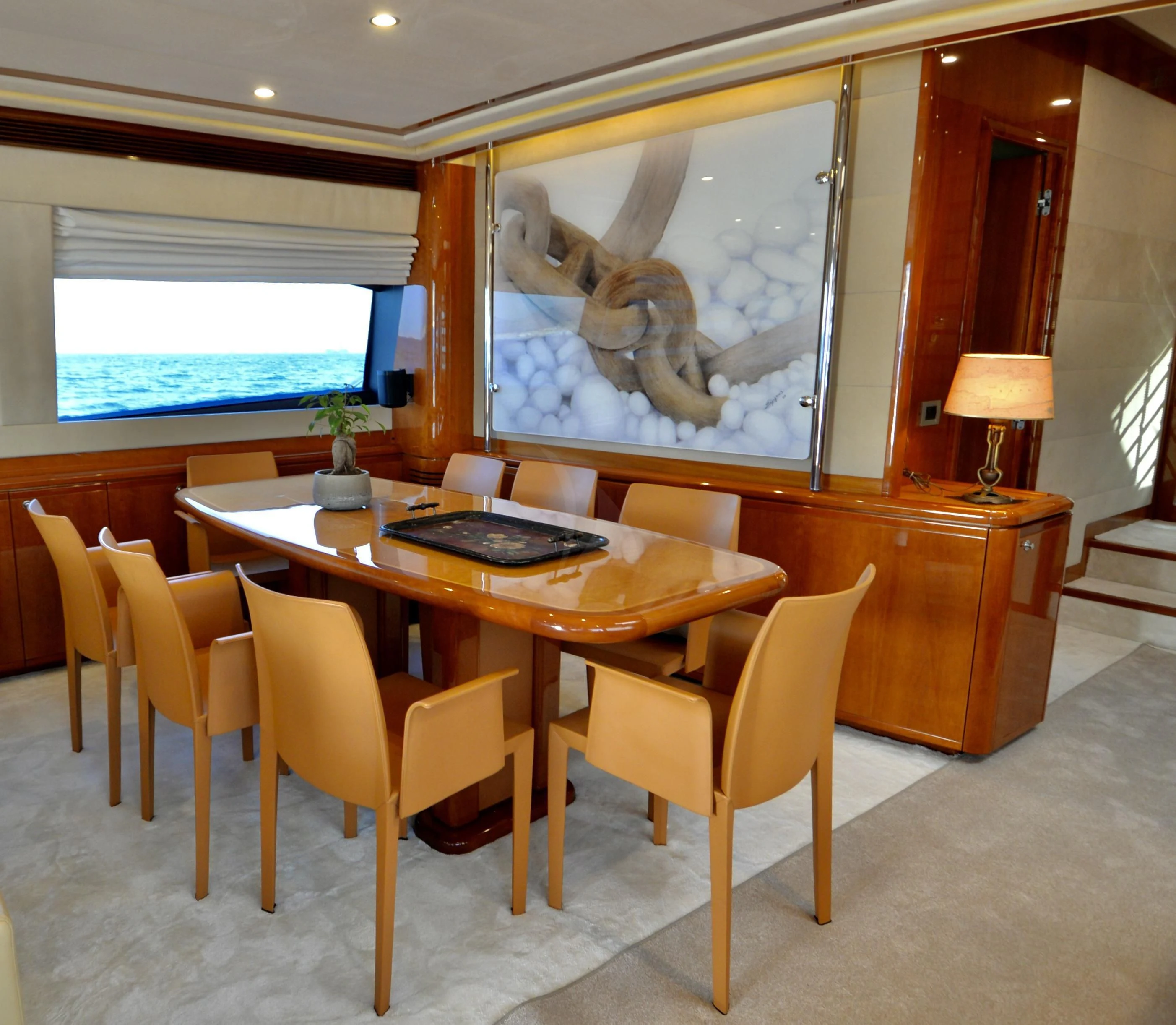a room with a table and chairs aboard ASTARTE Yacht for Sale