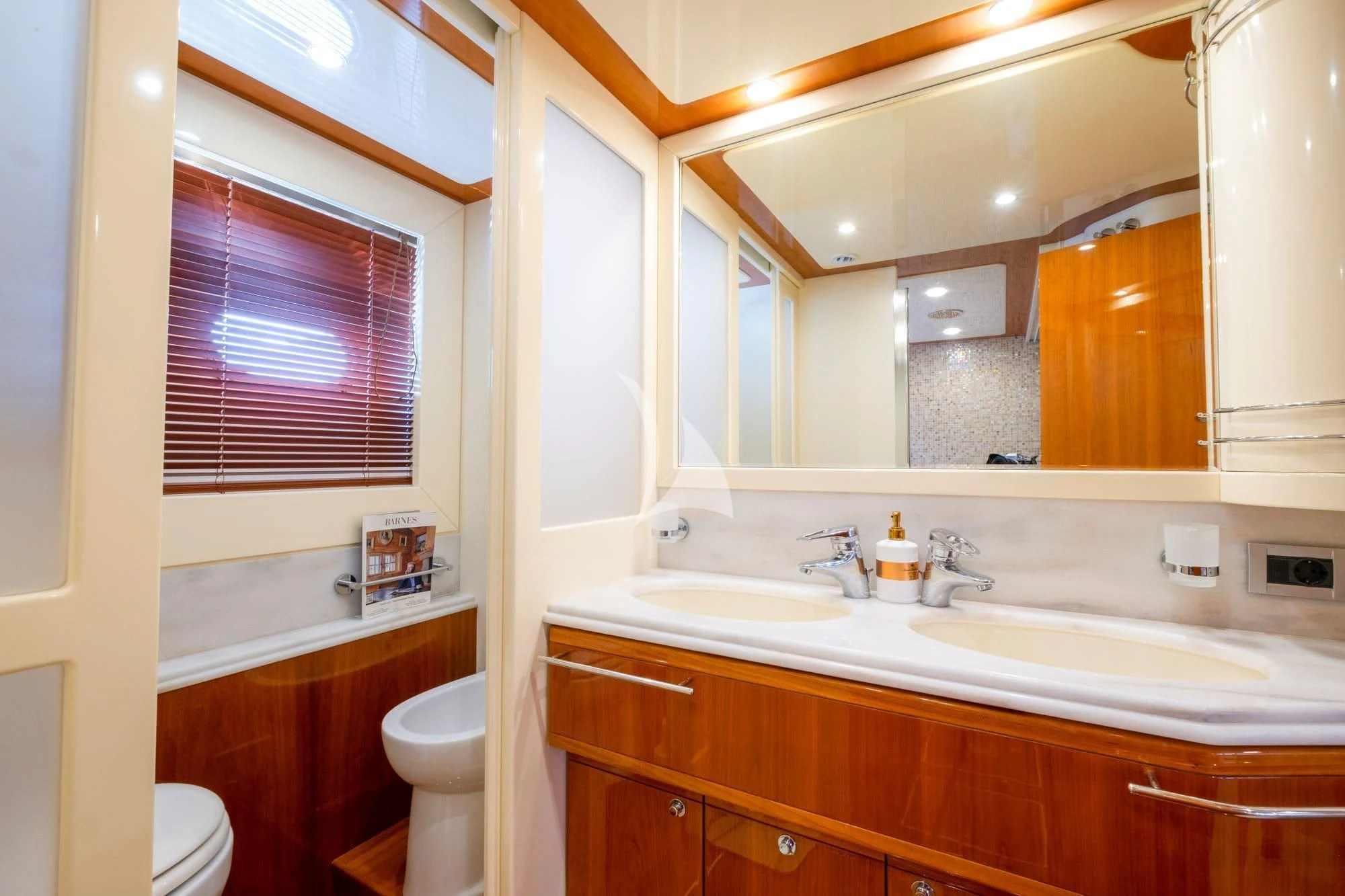 a bathroom with a large mirror aboard ASTARTE Yacht for Sale