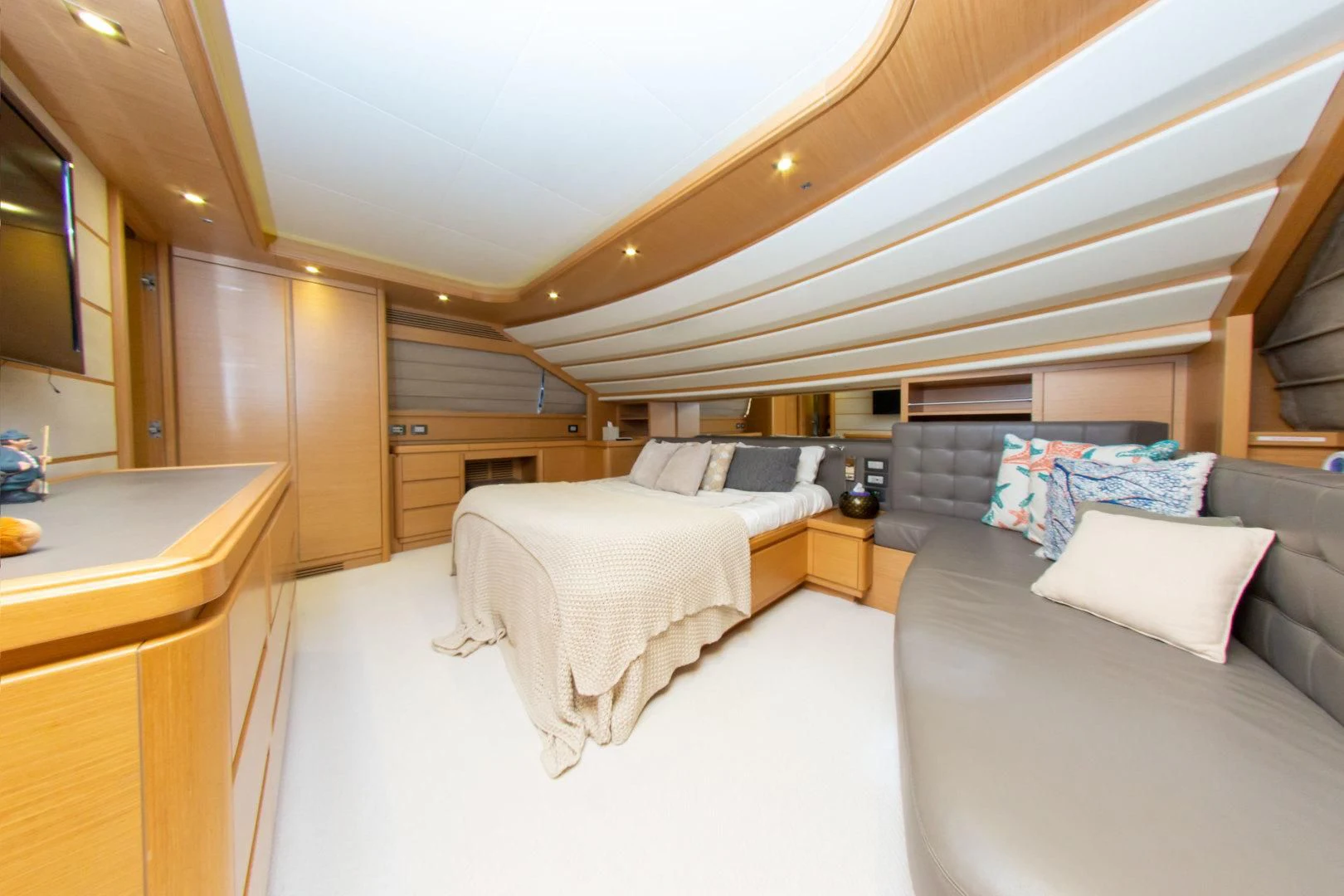 a bedroom with two beds aboard ADAR Yacht for Sale