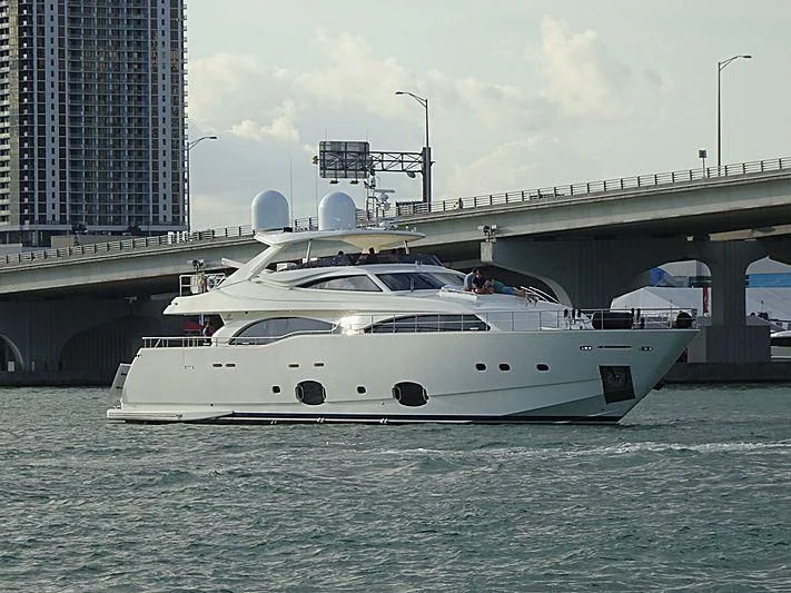 a white yacht in the water aboard ADAR Yacht for Sale