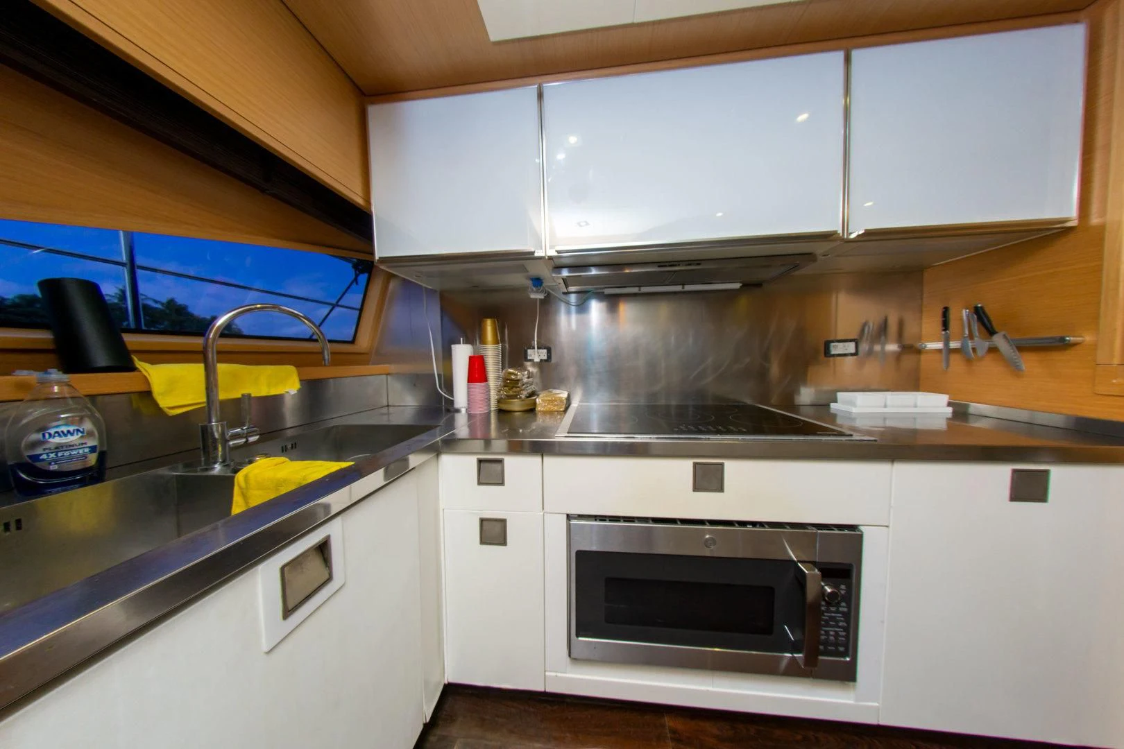 a kitchen with a microwave oven aboard ADAR Yacht for Sale