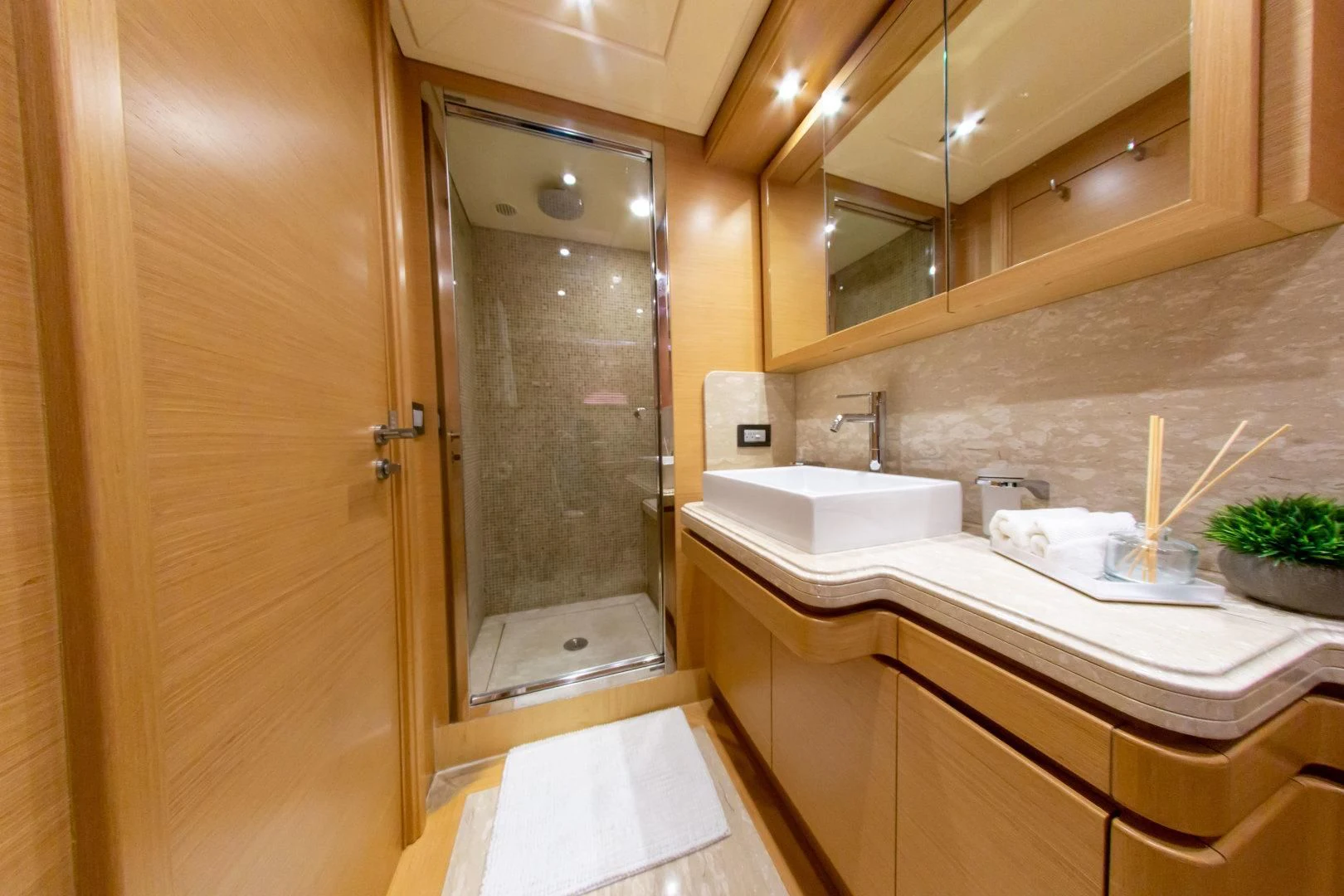 a bathroom with a large shower aboard ADAR Yacht for Sale