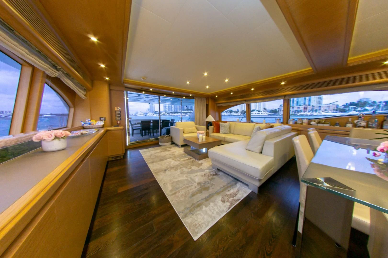 a living room with a large window aboard ADAR Yacht for Sale