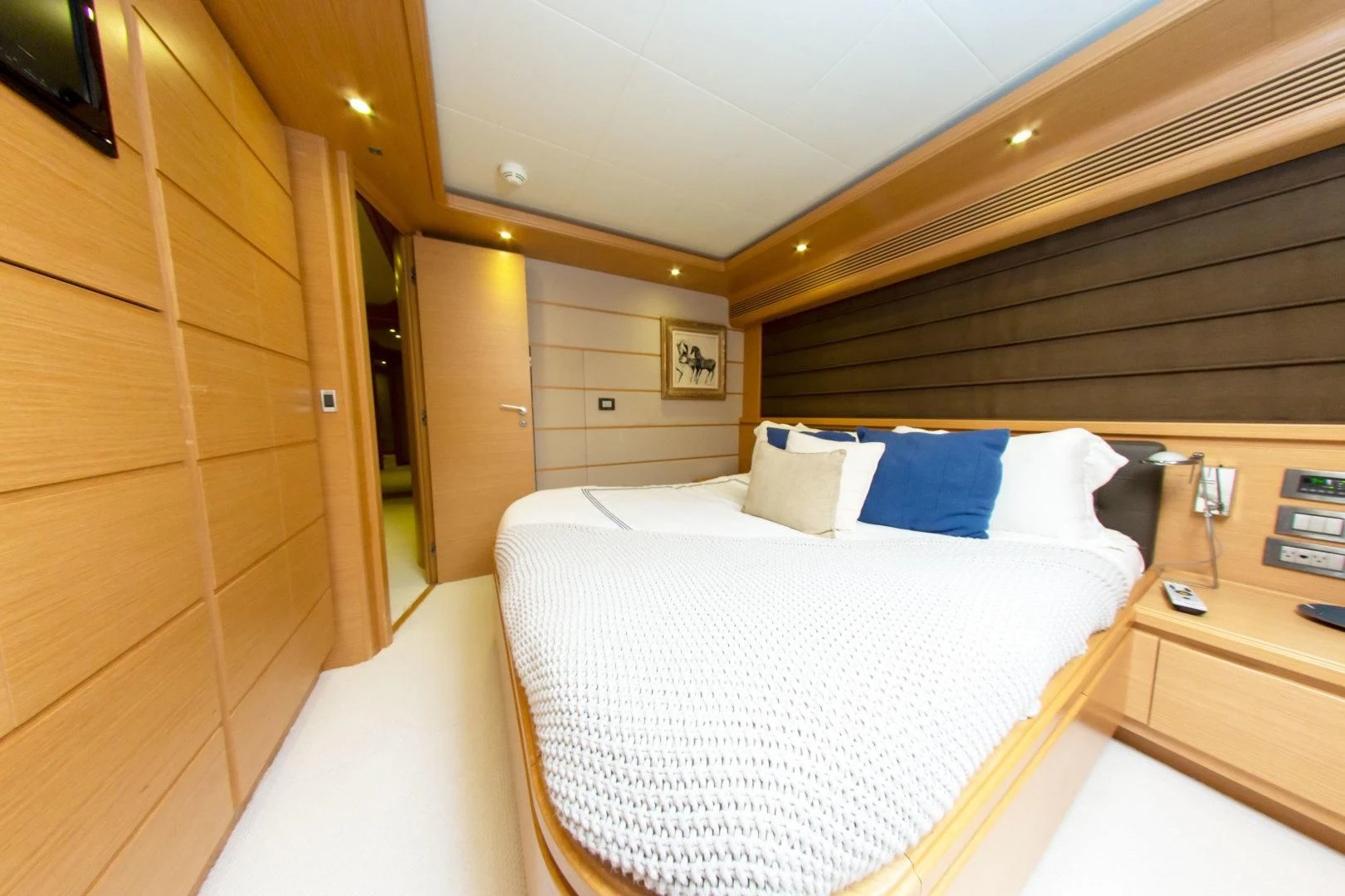 a bed in a room aboard ADAR Yacht for Sale