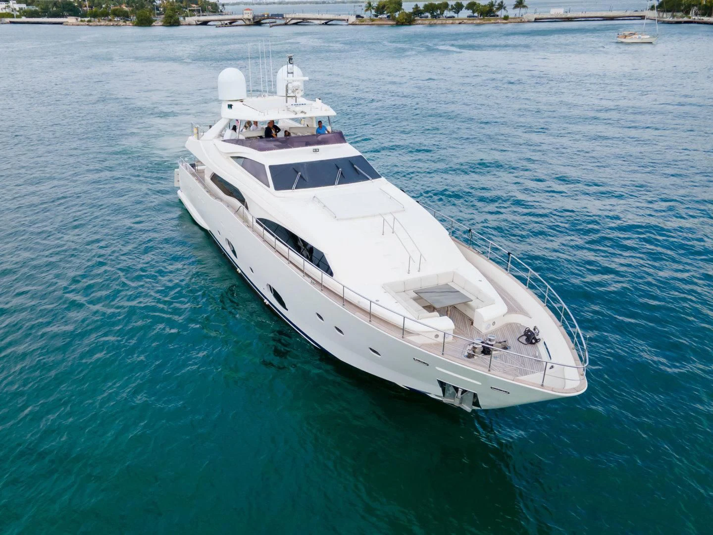 a white boat in the water aboard ADAR Yacht for Sale