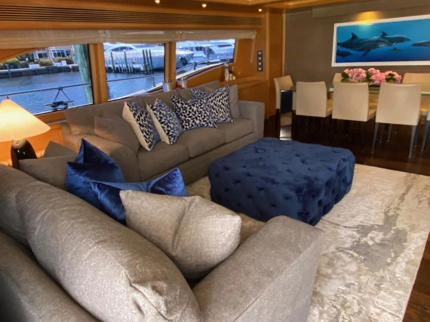 a living room with a couch and a table aboard ADAR Yacht for Sale