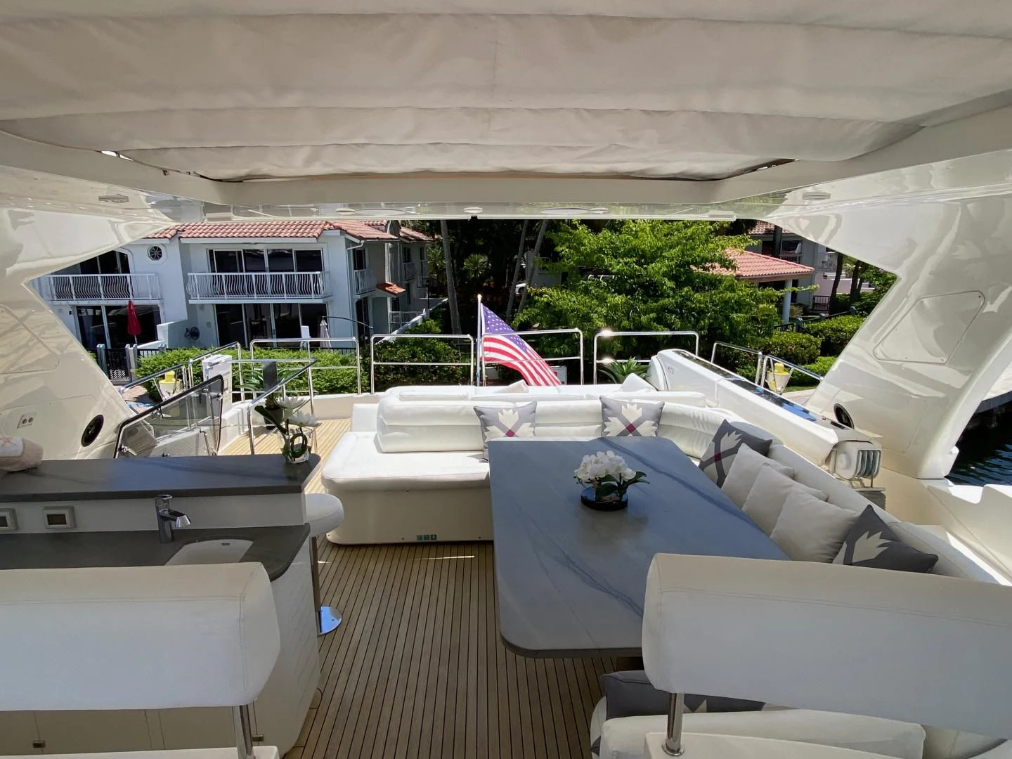 a room with a table and chairs aboard ADAR Yacht for Sale