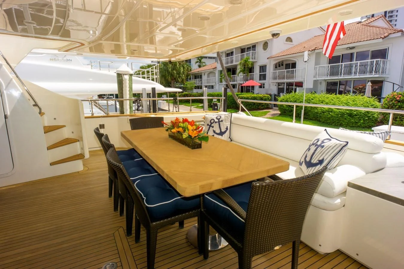 a tent with chairs and tables aboard ADAR Yacht for Sale
