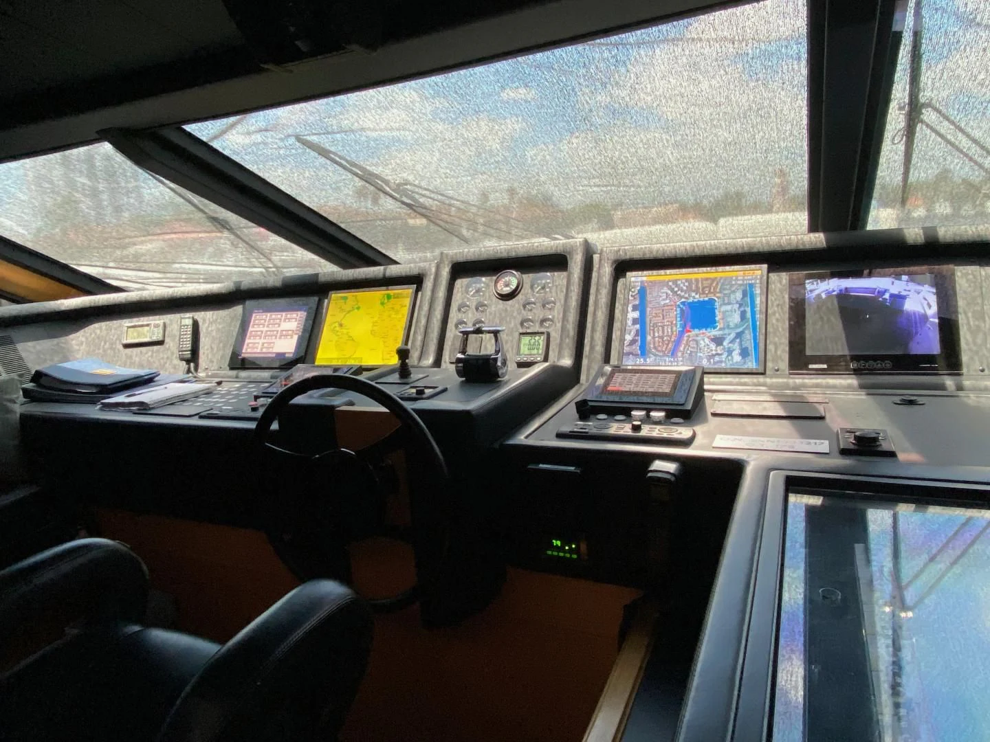 a room with computers and monitors aboard ADAR Yacht for Sale