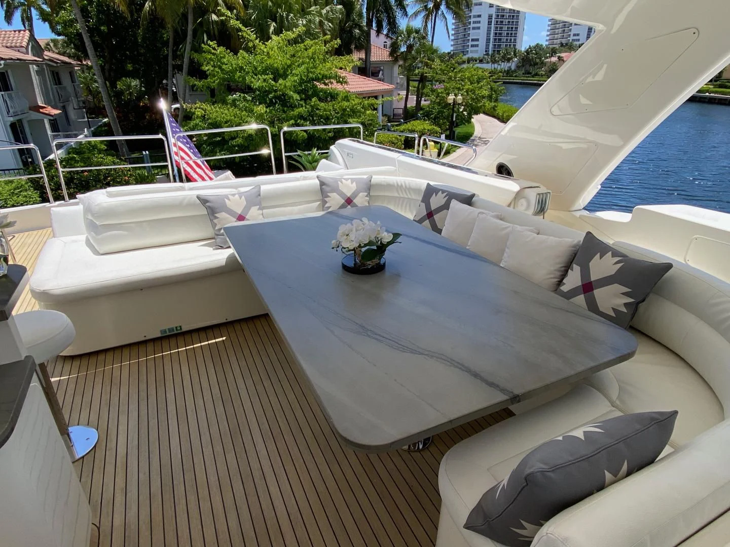 a lounge chair on a deck aboard ADAR Yacht for Sale
