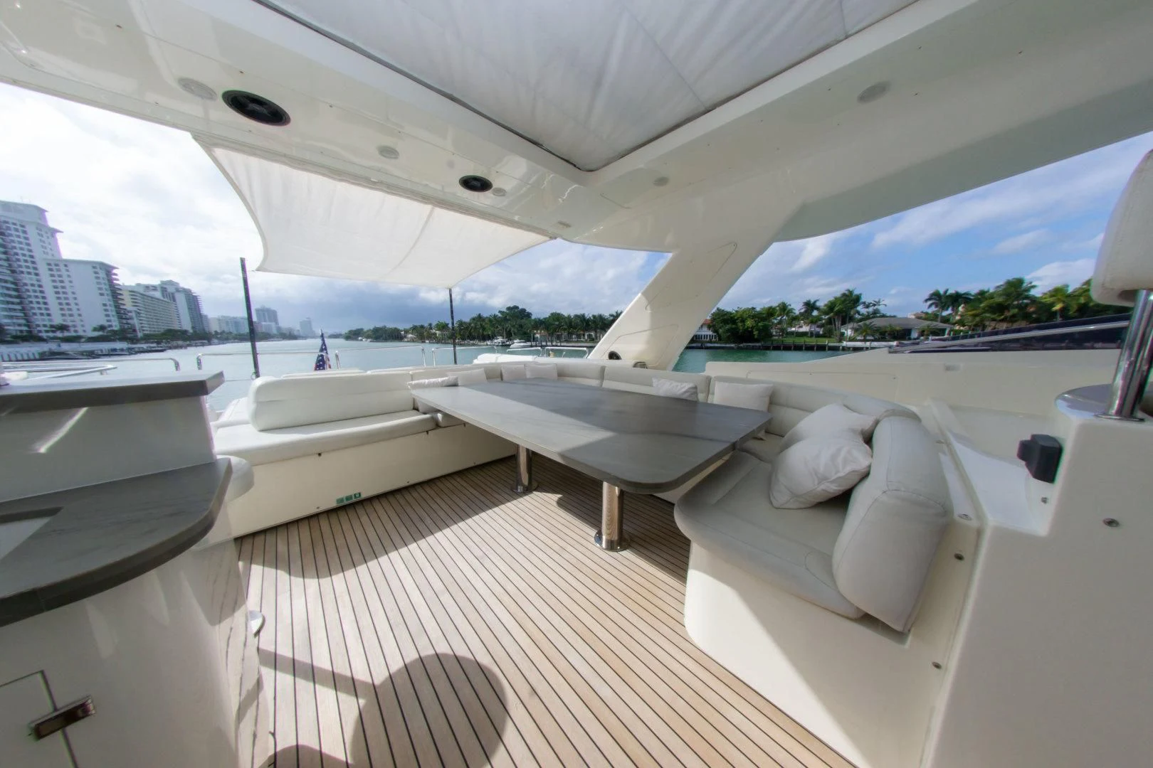 a room with a bed and a table aboard ADAR Yacht for Sale