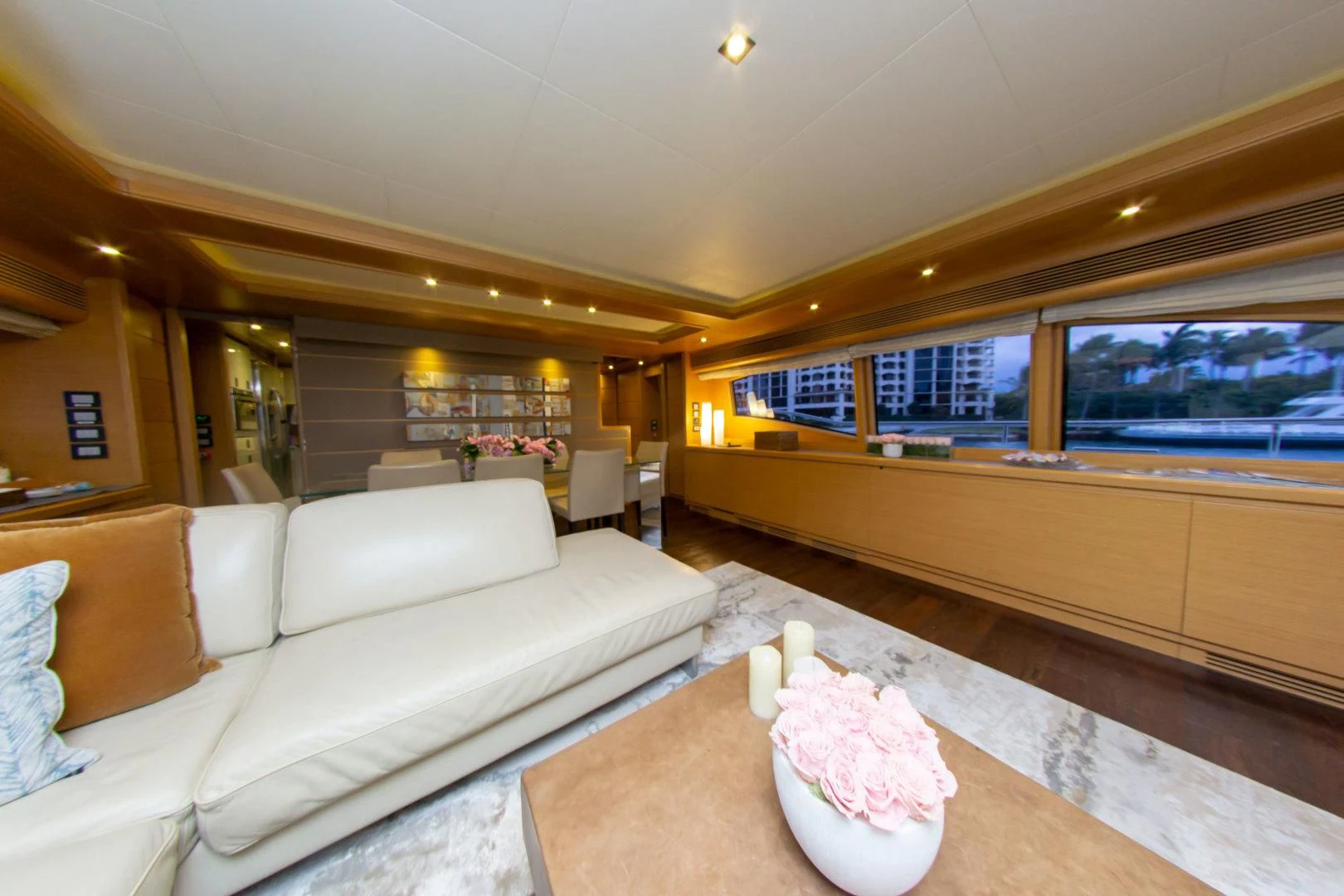a living room with a large window aboard ADAR Yacht for Sale