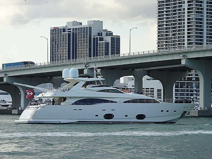 a white boat in the water aboard ADAR Yacht for Sale