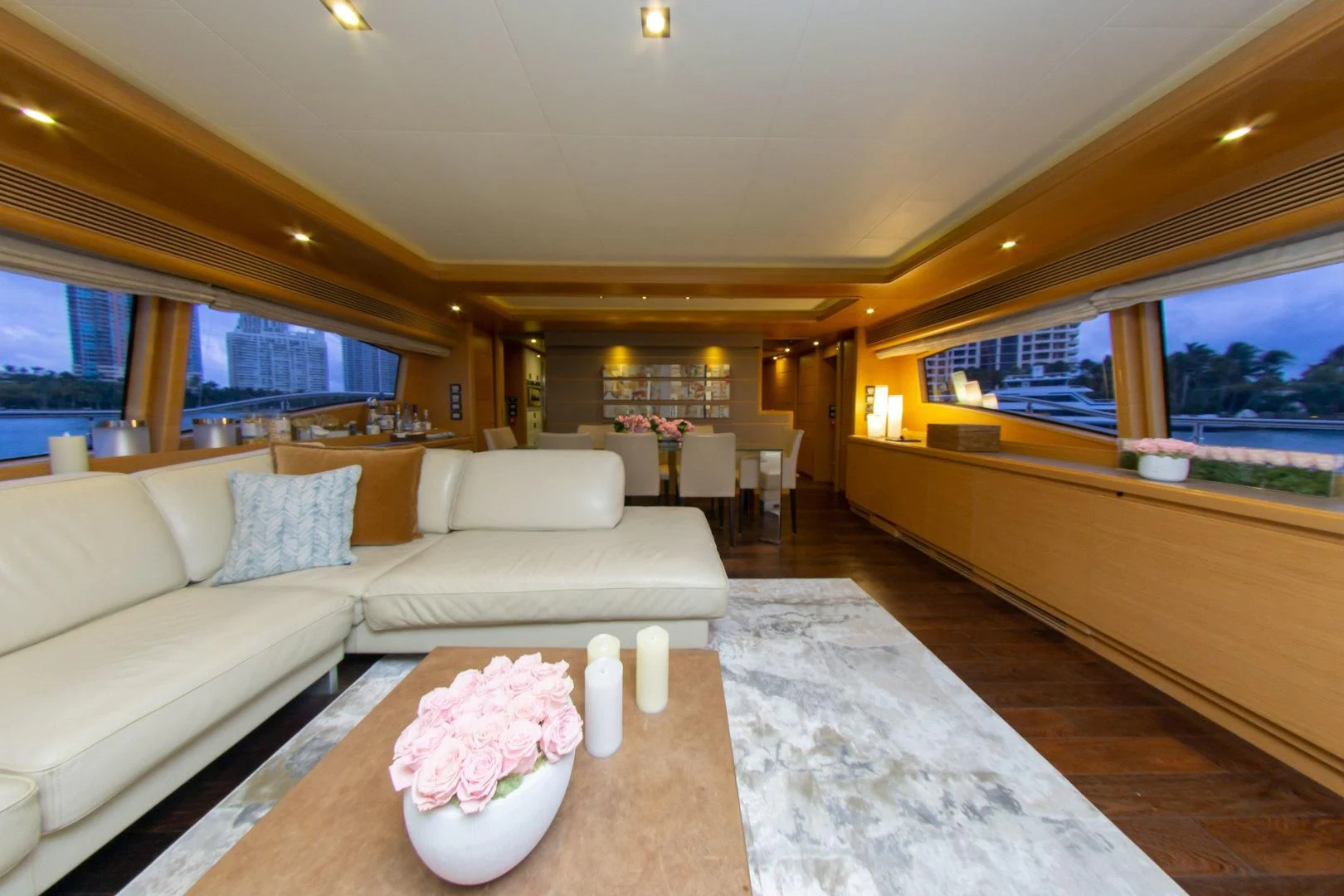 a living room with a large window aboard ADAR Yacht for Sale