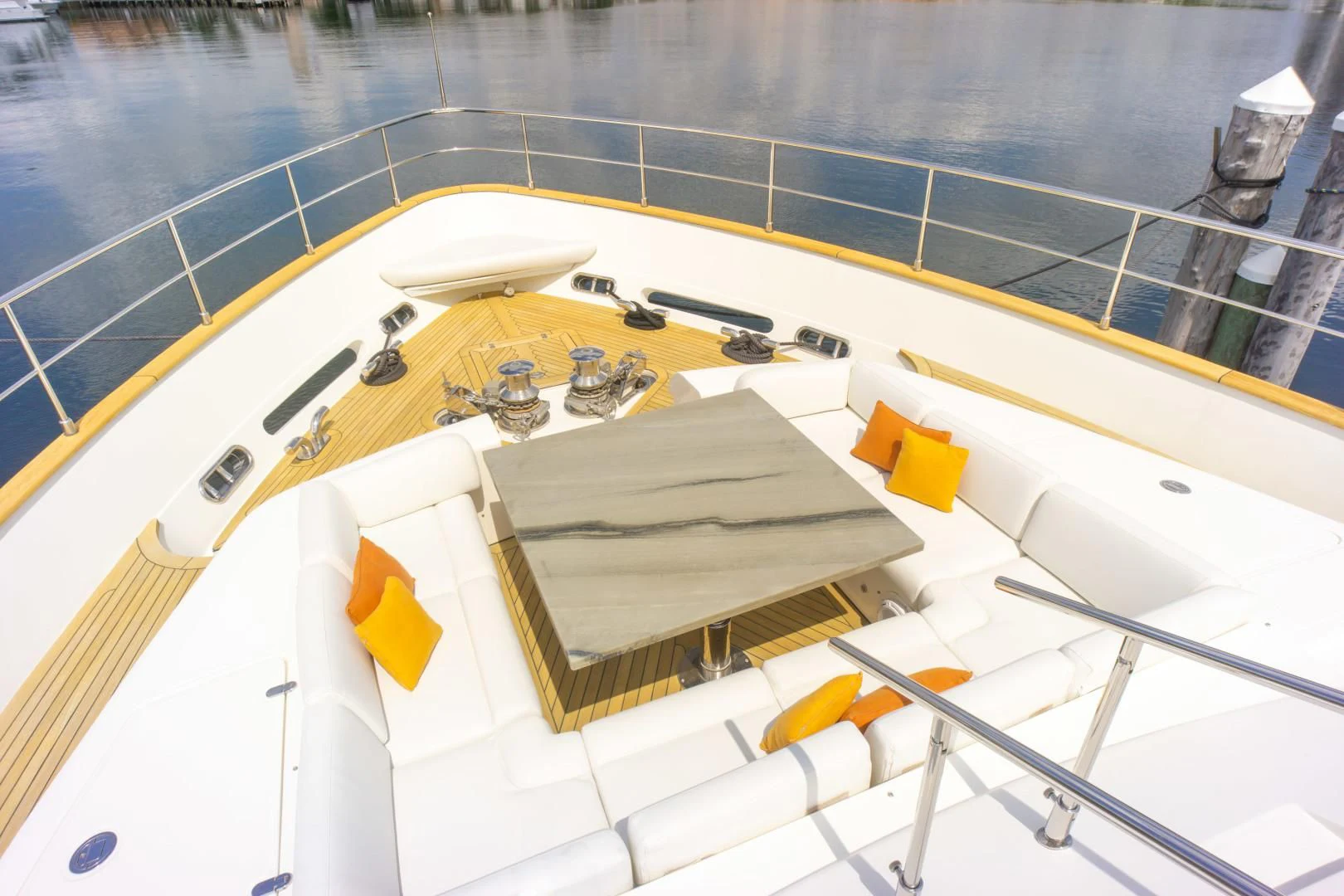 a boat with a seat aboard ADAR Yacht for Sale