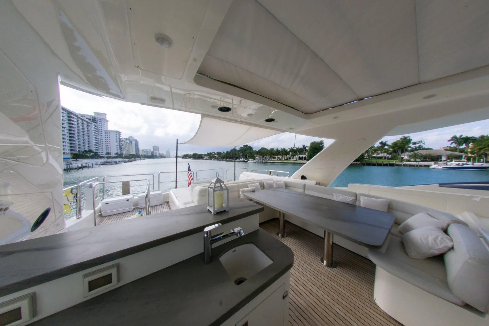 a room with a sink and a bed aboard ADAR Yacht for Sale