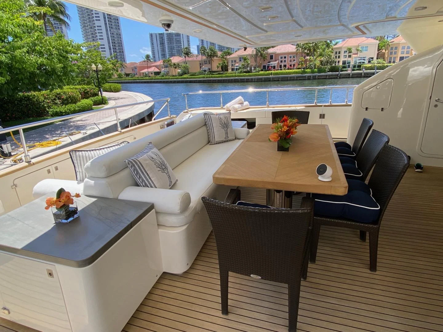 a room with a table chairs and a window aboard ADAR Yacht for Sale