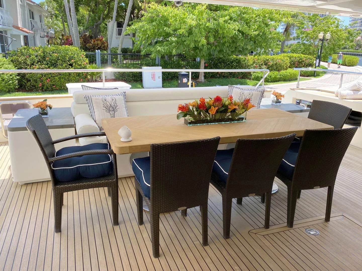 a table with chairs around it aboard ADAR Yacht for Sale