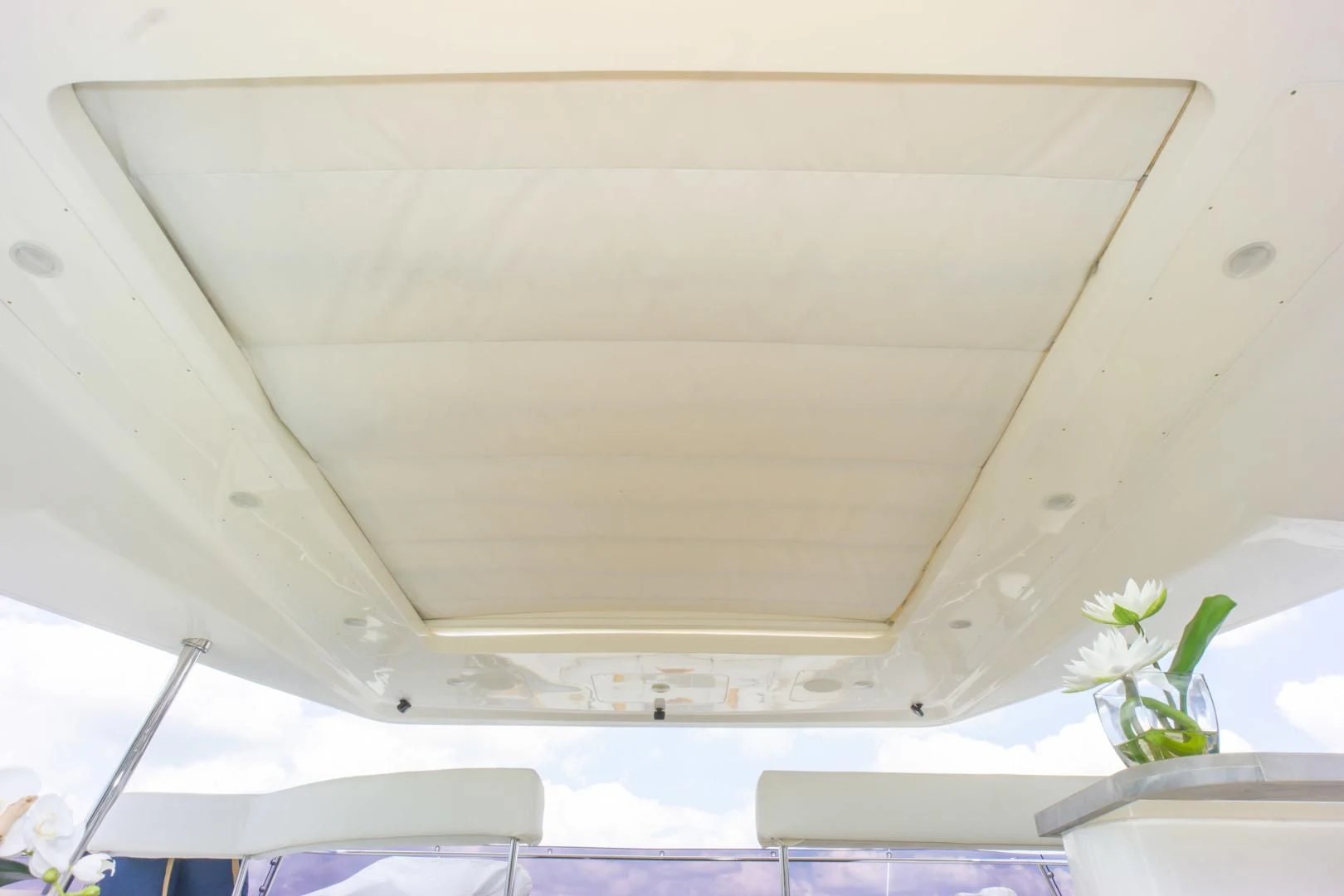 a plant in a pot on a white ceiling aboard ADAR Yacht for Sale