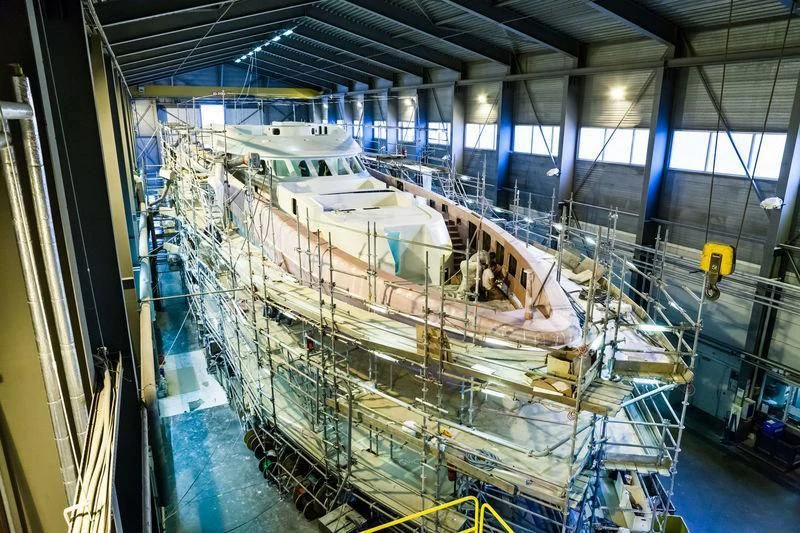 a large machine in a factory aboard MASA Yacht for Sale