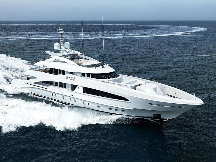 a white yacht on the water aboard MASA Yacht for Sale