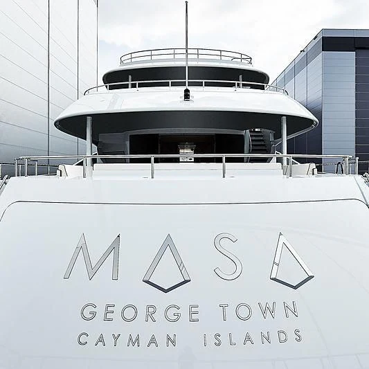 a sign on a building aboard MASA Yacht for Sale
