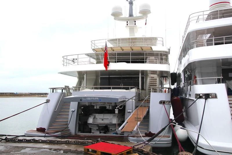 a boat docked at a port aboard LIBRA OMEGA Yacht for Sale