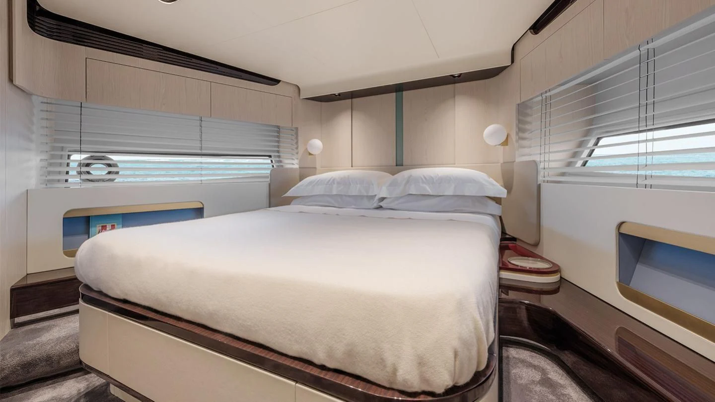 a room with a bed and a window aboard ARES N Yacht for Sale