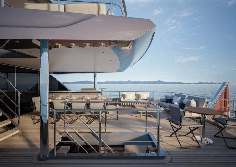 a deck with chairs and tables on it aboard A SALT WEAPON Yacht for Charter