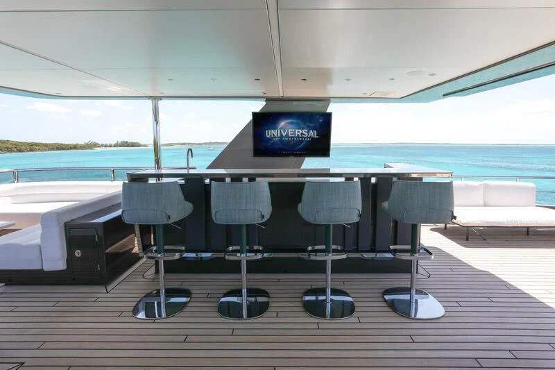 a table with chairs on it aboard A SALT WEAPON Yacht for Charter