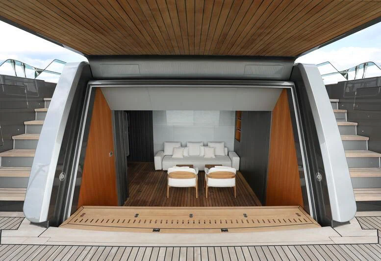 a wooden house with a staircase aboard A SALT WEAPON Yacht for Charter