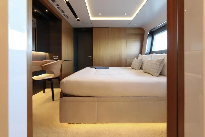 a bed in a room aboard A SALT WEAPON Yacht for Charter