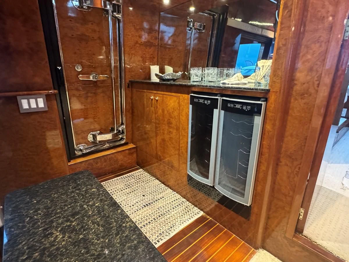 a kitchen with a large glass shower aboard DREAMCHASER Yacht for Sale