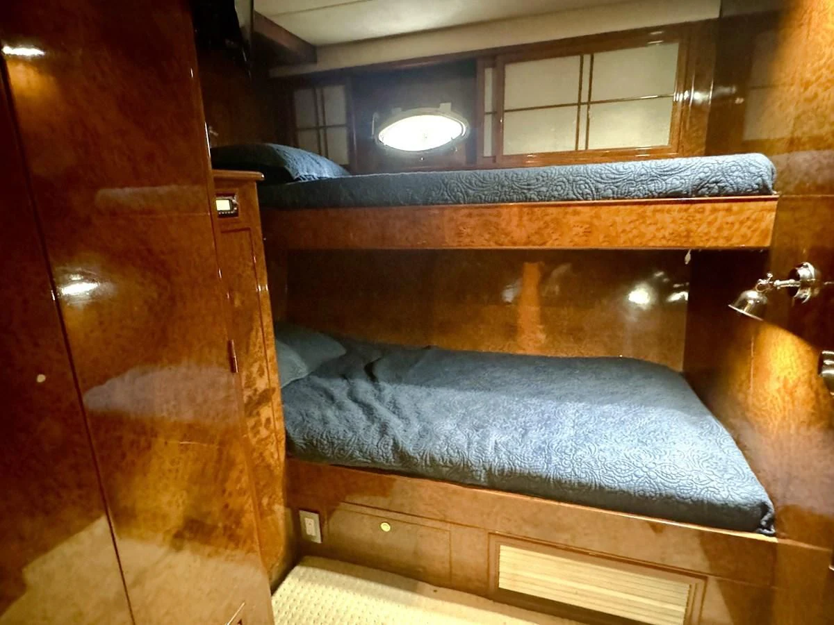a bed in a room aboard DREAMCHASER Yacht for Sale