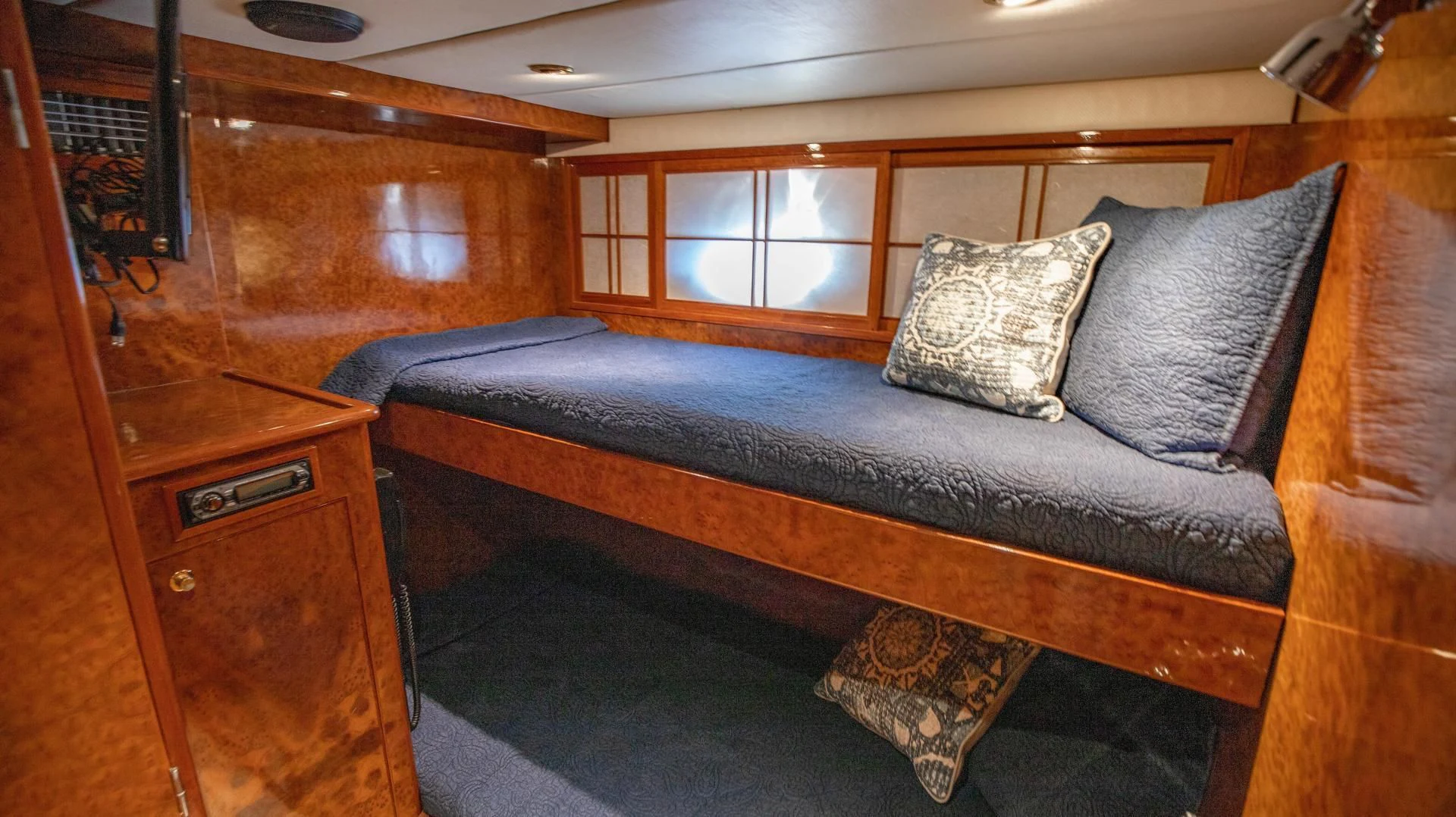 a bed in a room aboard DREAMCHASER Yacht for Sale