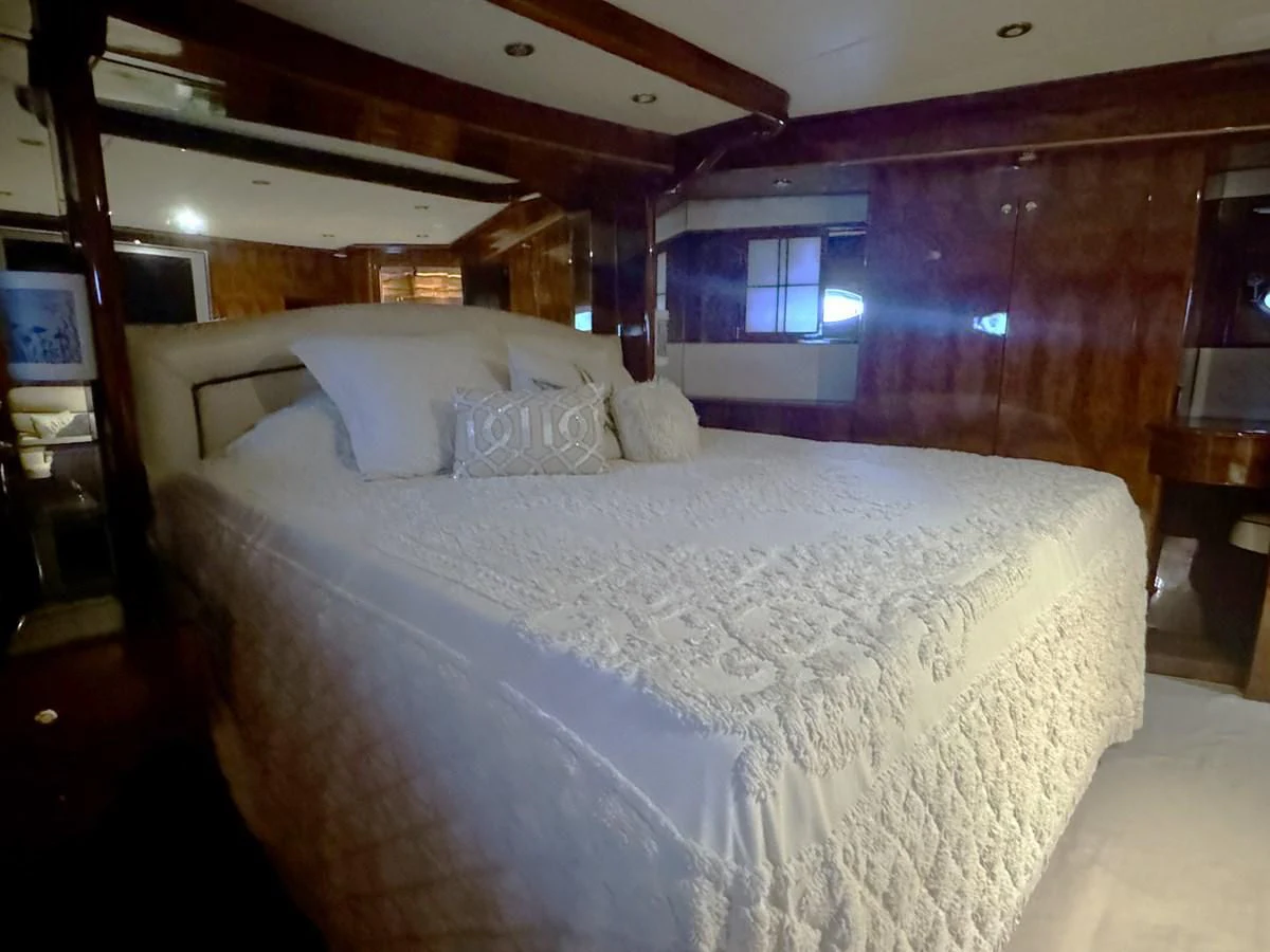 a bed in a cabin aboard DREAMCHASER Yacht for Sale