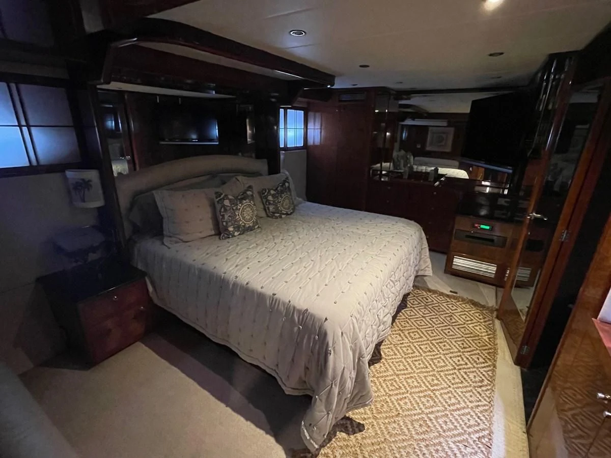 a bed in a room aboard DREAMCHASER Yacht for Sale