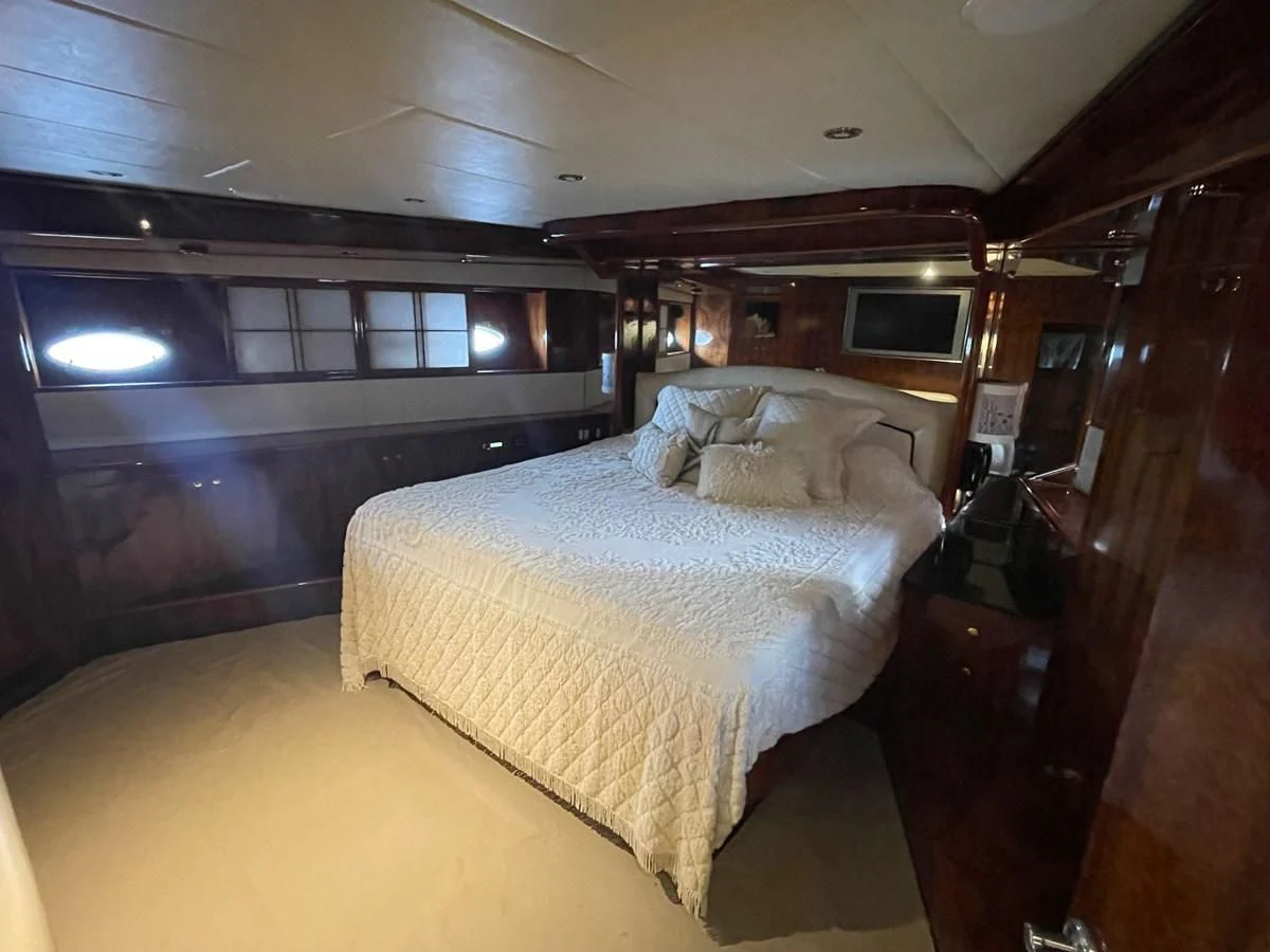 a bed in a cabin aboard DREAMCHASER Yacht for Sale