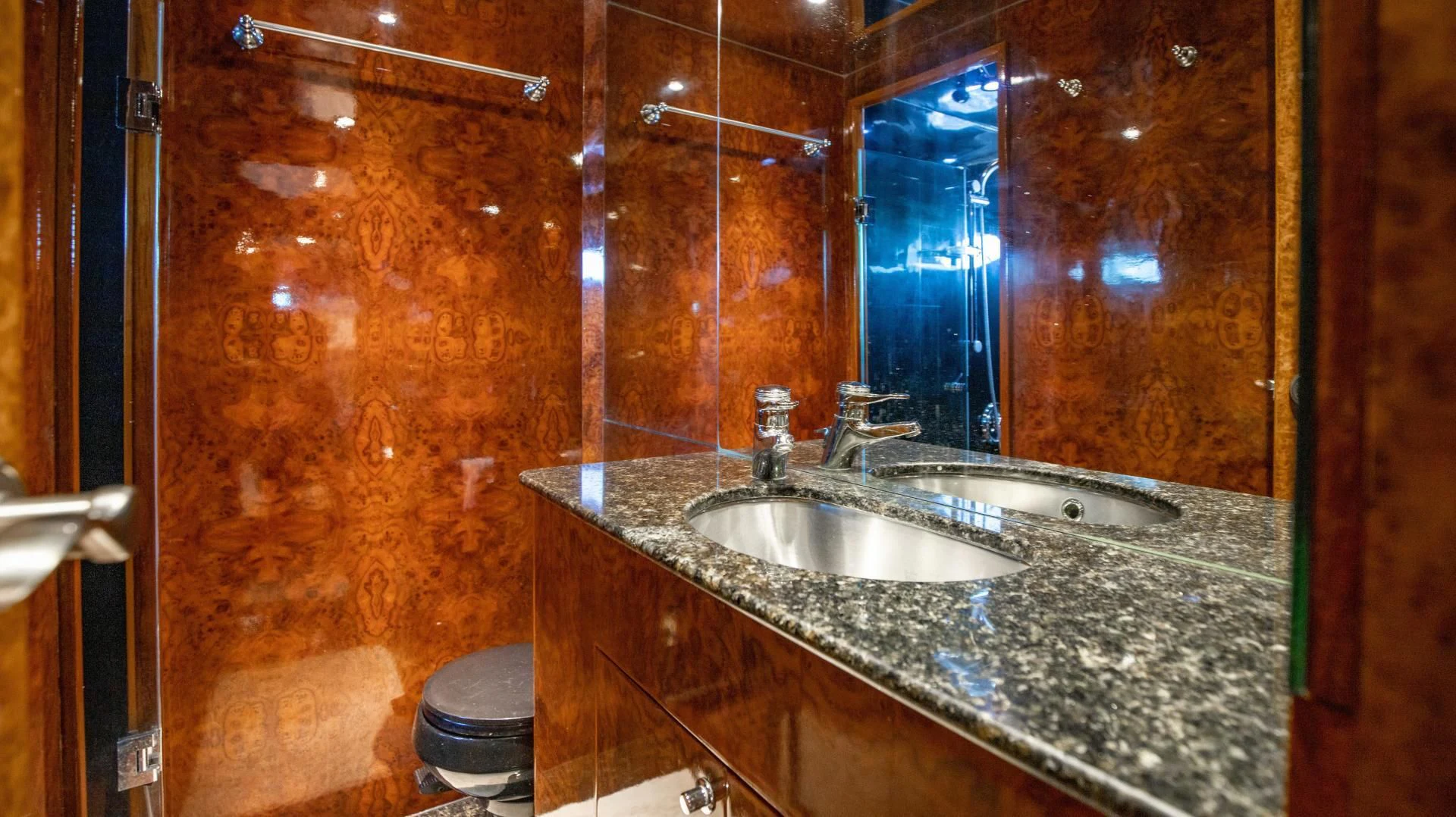 a bathroom with a large mirror aboard DREAMCHASER Yacht for Sale