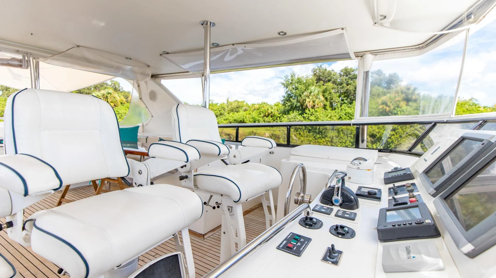 inside of a car aboard DREAMCHASER Yacht for Sale