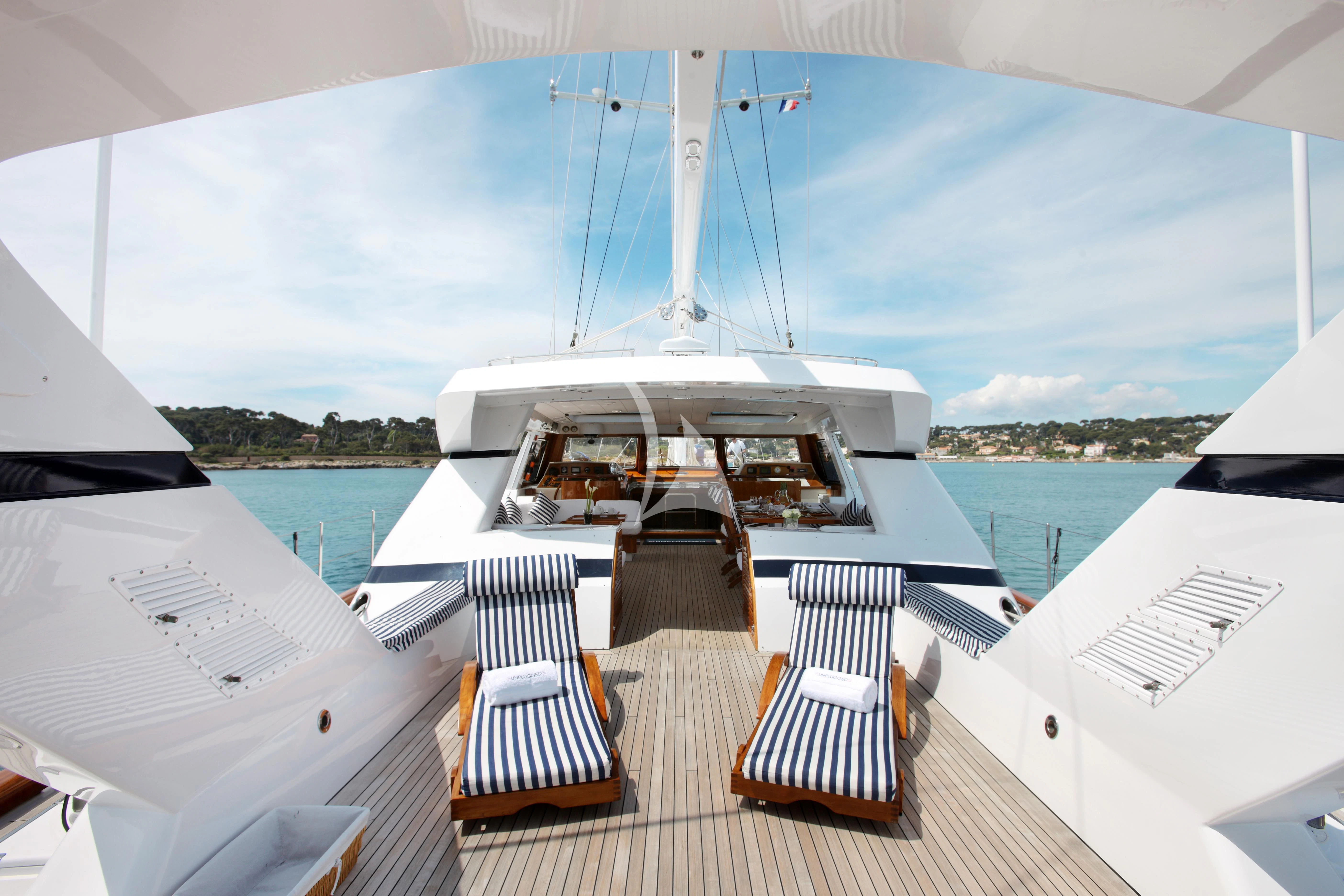 a large cruise ship in the water aboard UNPLUGGED Yacht for Sale