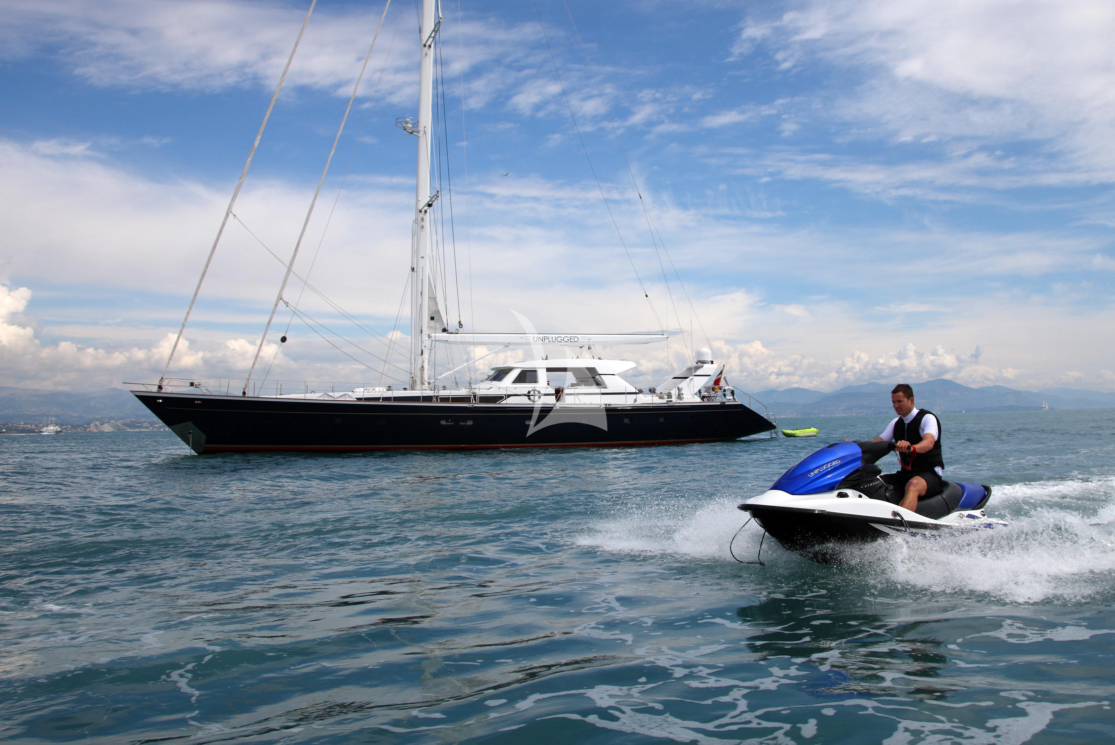 a man on a boat aboard UNPLUGGED Yacht for Sale