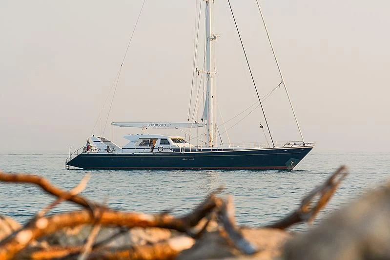 a boat in the water aboard UNPLUGGED Yacht for Sale
