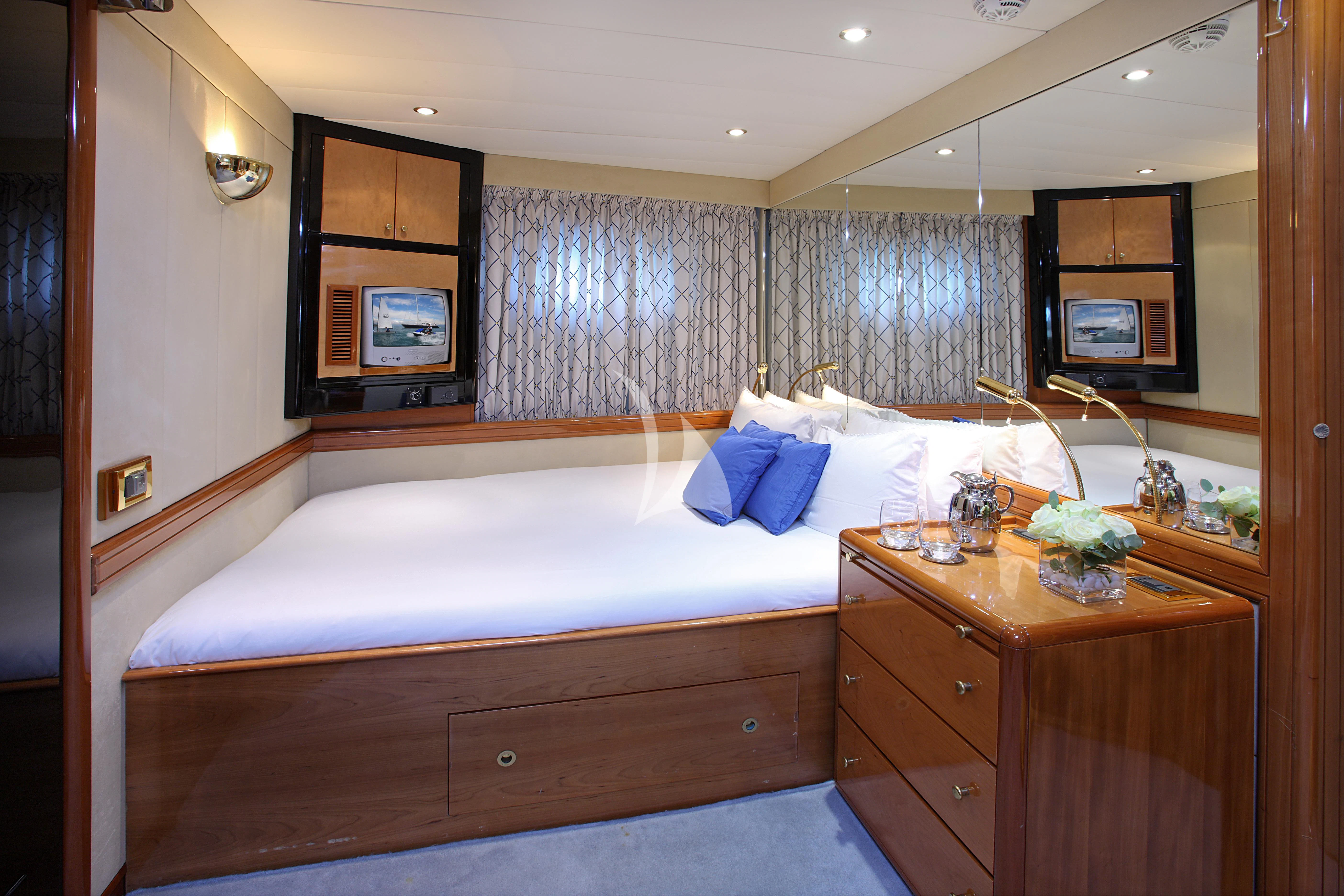 a bed in a room aboard UNPLUGGED Yacht for Sale